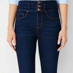 Ann Taylor women's dark blue jeans, size 2. Three-button closure, high-waisted.